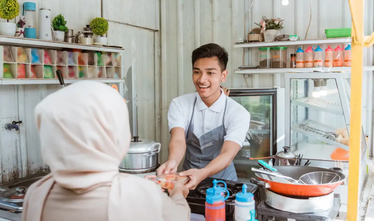 ムスリム女性を接客する男性